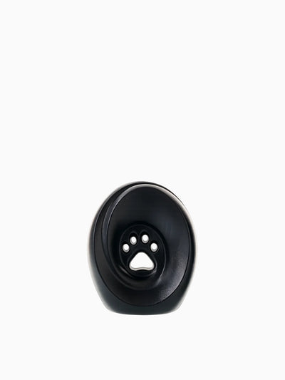 Svart rund kjæledyrurne i resirkulerbar polyetylen med poteavtrykk-åpning for aske fra kjæledyr